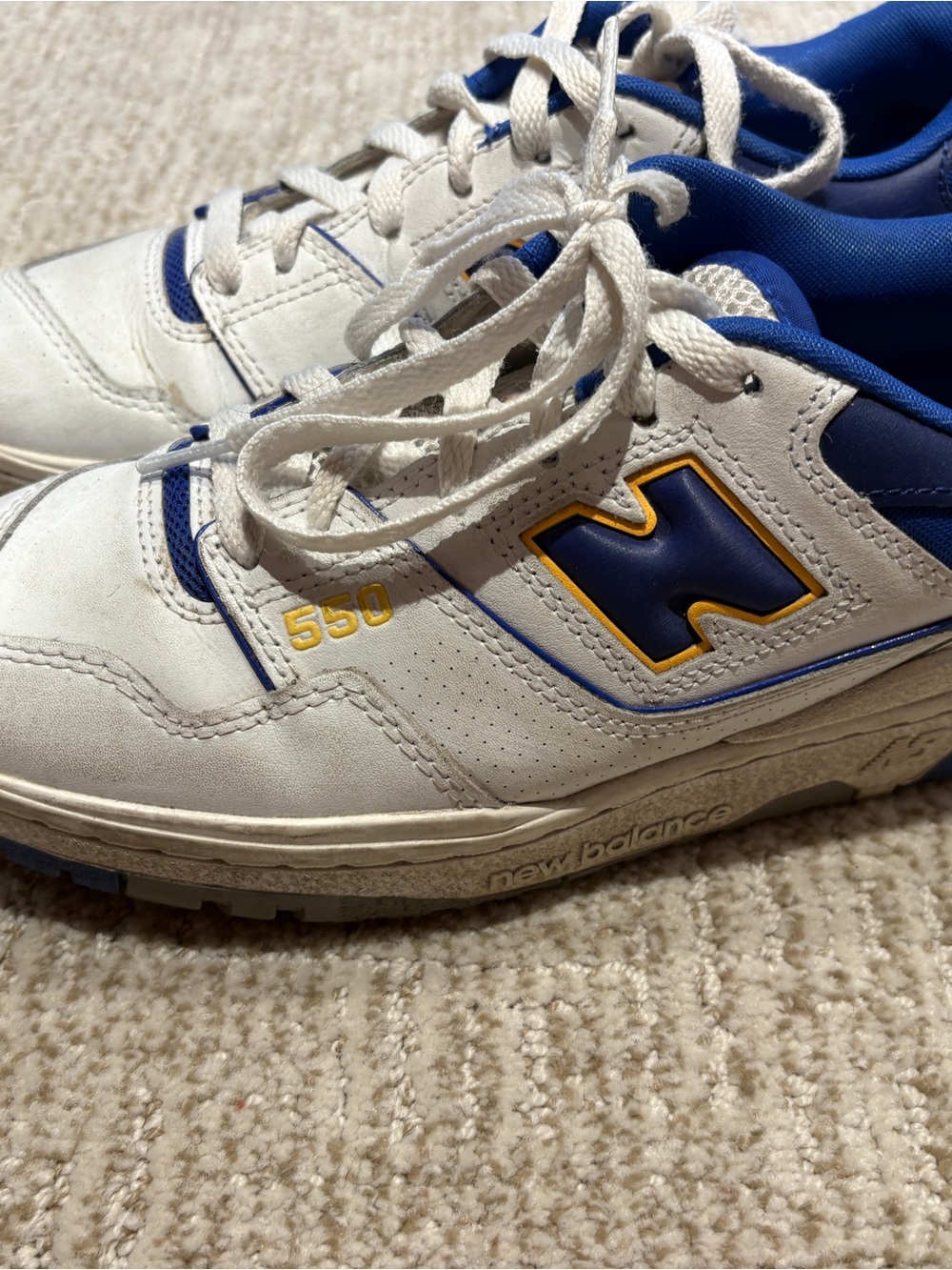 New Balance Kids White Sneakers with Blue and Yellow Accents